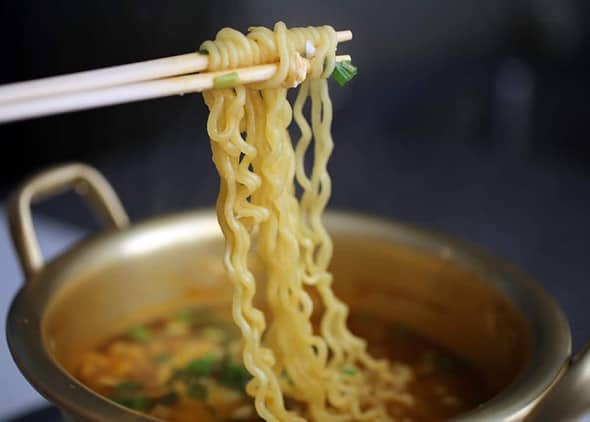 A hearty miso ramen bowl with sweet corn, butter, bean sprouts and ground pork